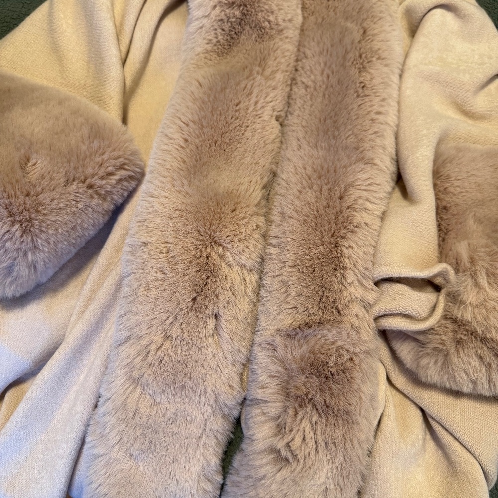 Gorgeous cape with sleeves…